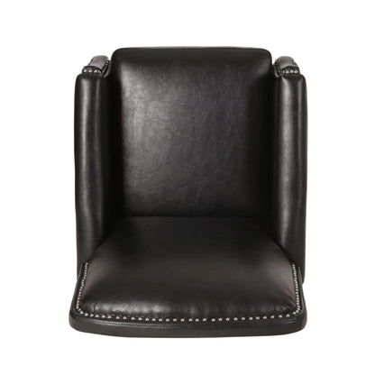 Top view of a black leather chair with studded details on a white background