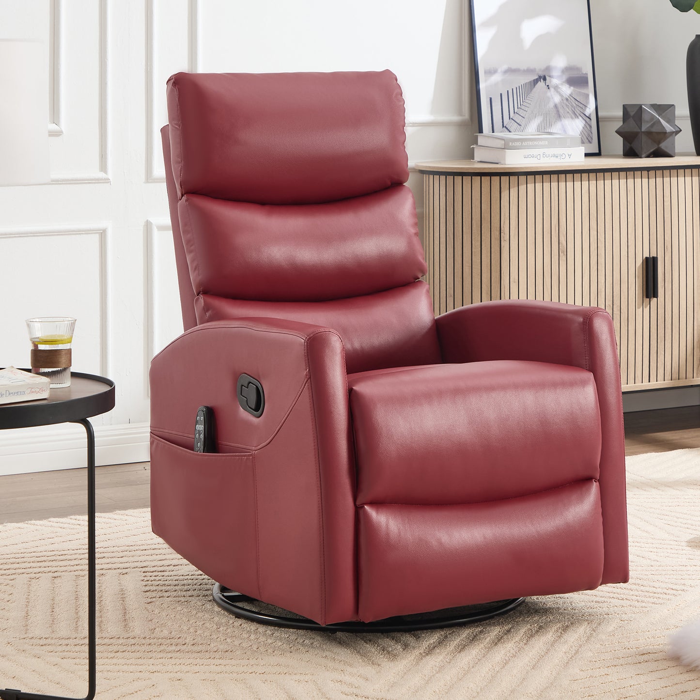 Red leather recliner chair in a living room setting with a side table and decor items.