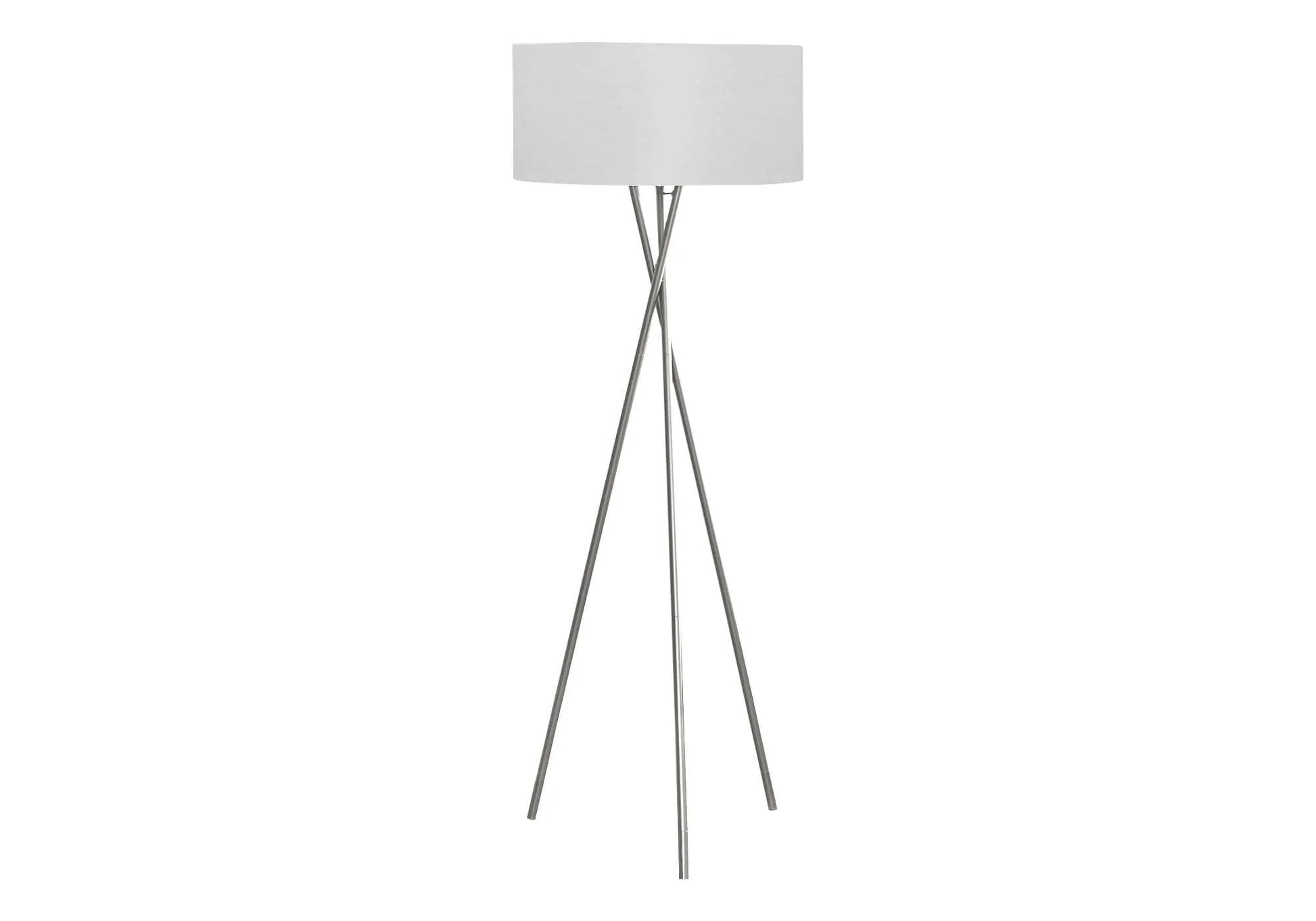 Tripod floor lamp with silver legs and a white shade on a white background