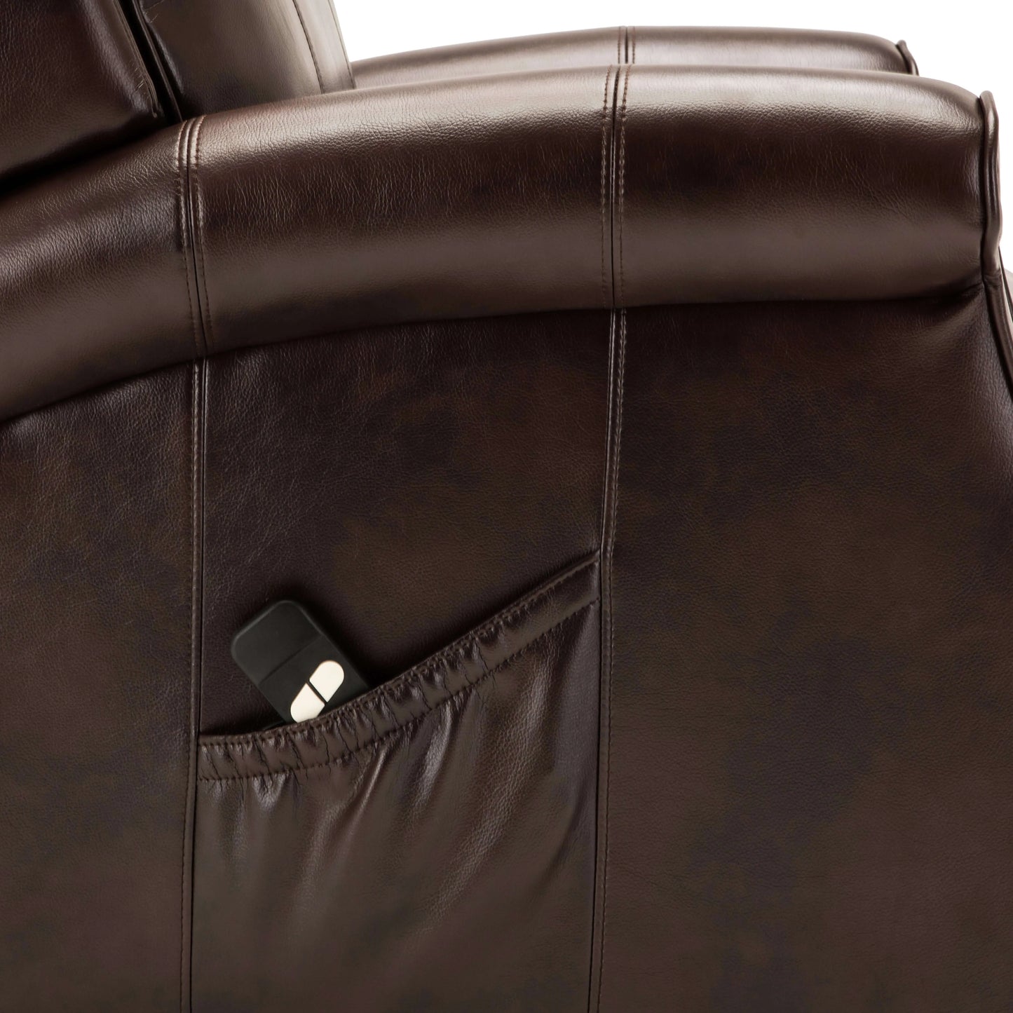 Close-up of a brown leather recliner with a pocket.