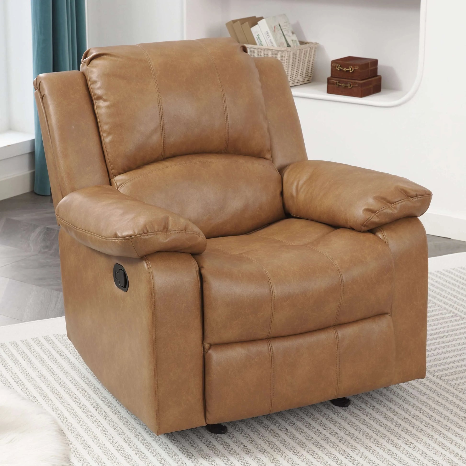 Brown leather recliner chair in a room with a window and small table.