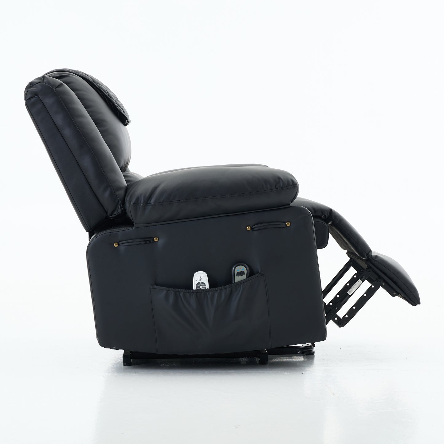 Side view of a black recliner chair with footrest extended on a white background