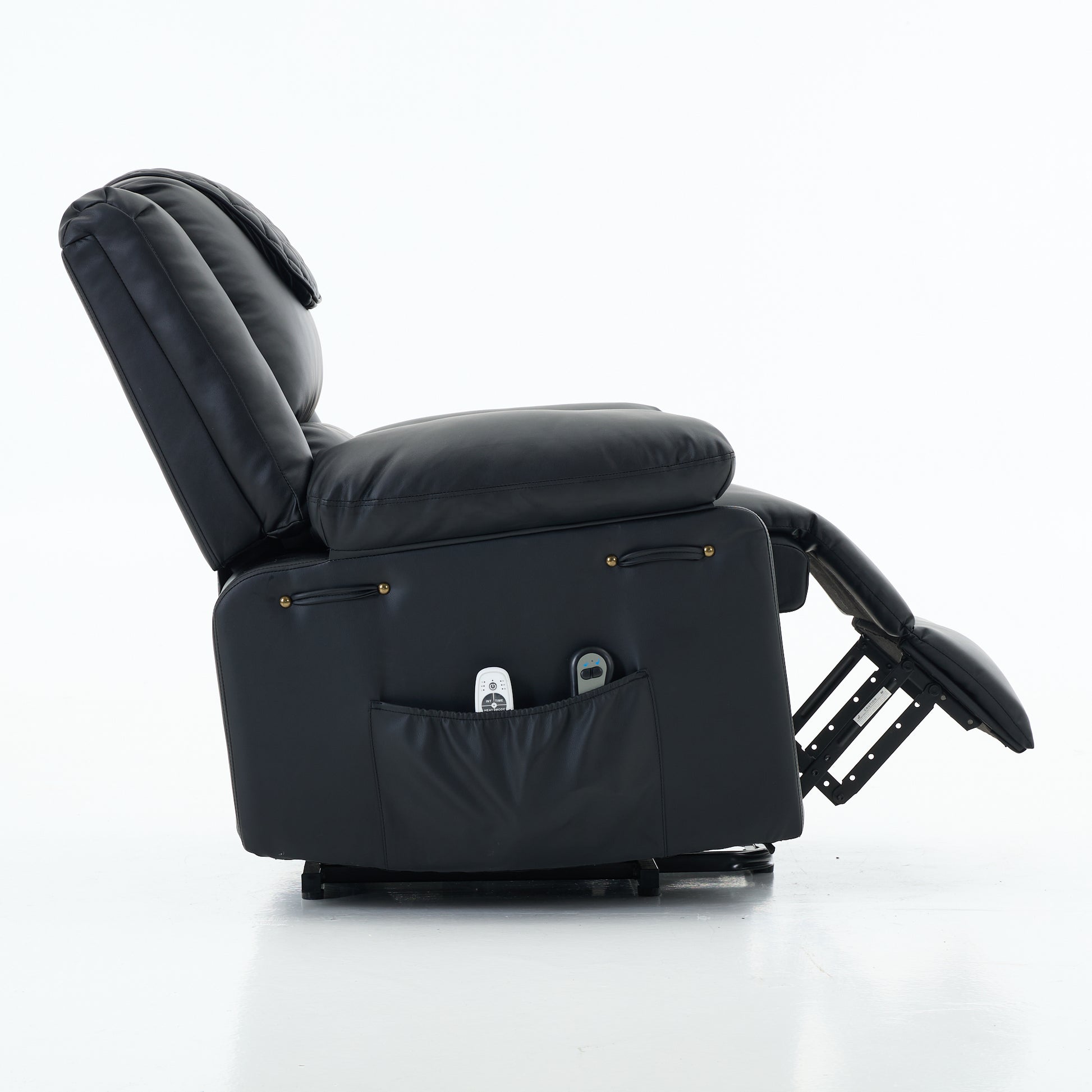 Side view of a black recliner chair with footrest extended on a white background