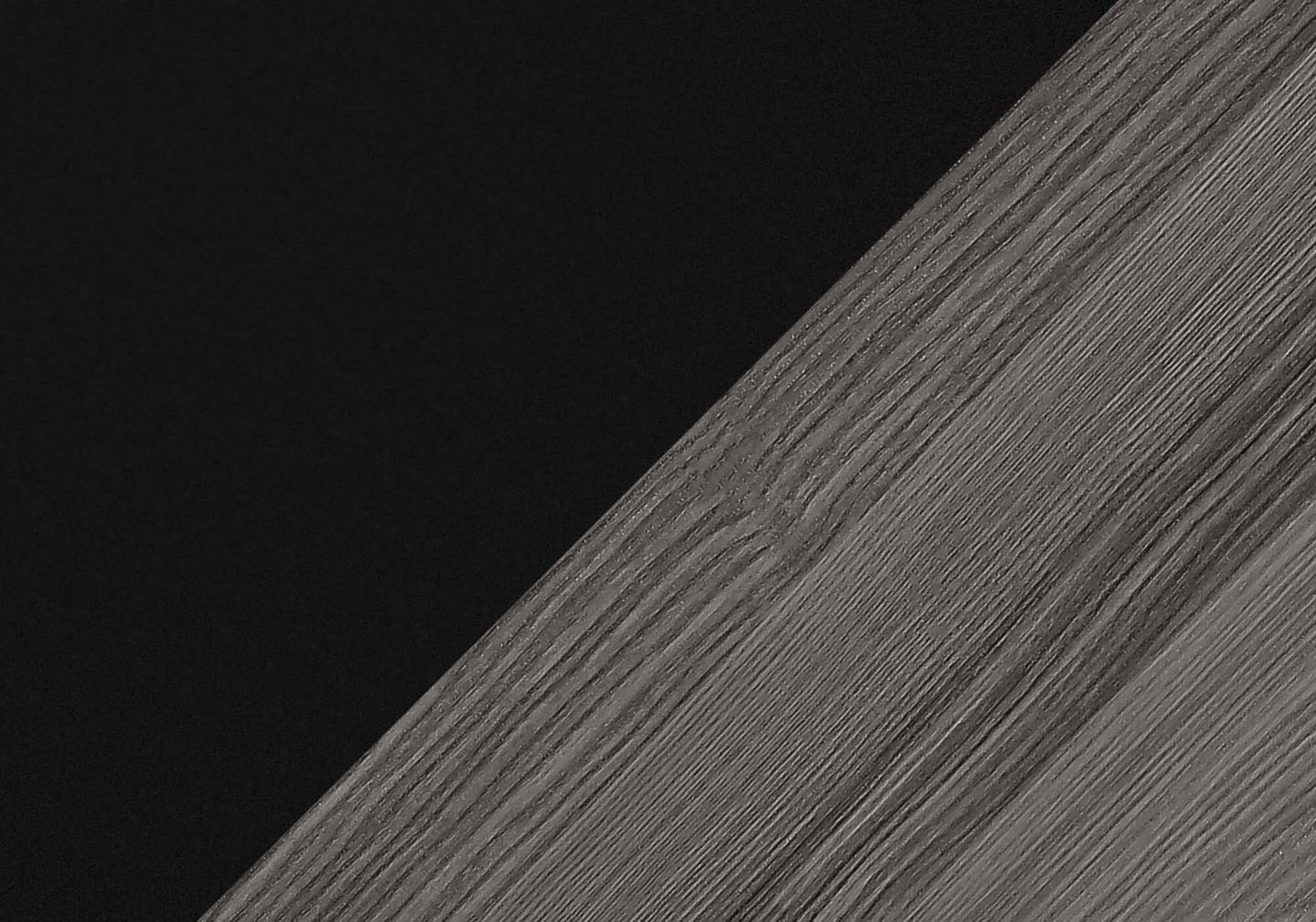 Close-up of a textured black and gray surface