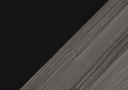 Close-up of a textured black and gray surface