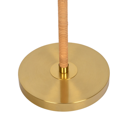 Close up of a floor lamp brass base on a white background