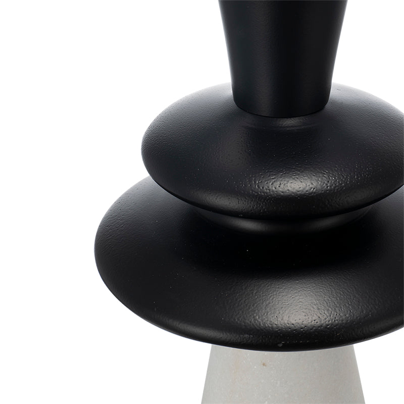 Close-up of a black base on a white background