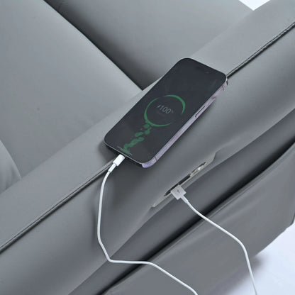 Phone with a charging cable connected to a blue gray recliner chair USB port