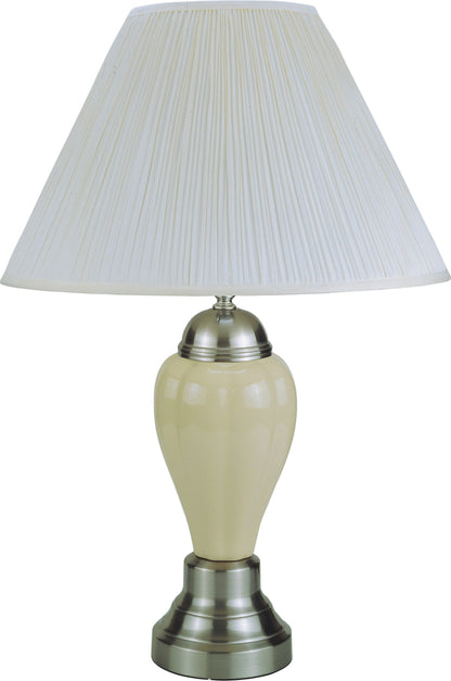 Table lamp with a white pleated shade and cream base on a white background