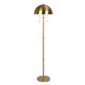 Brass floor lamp with a white background