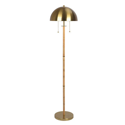 Brass floor lamp with a white background