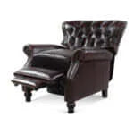 Dark brown leather recliner chair with footrest extended on a white background