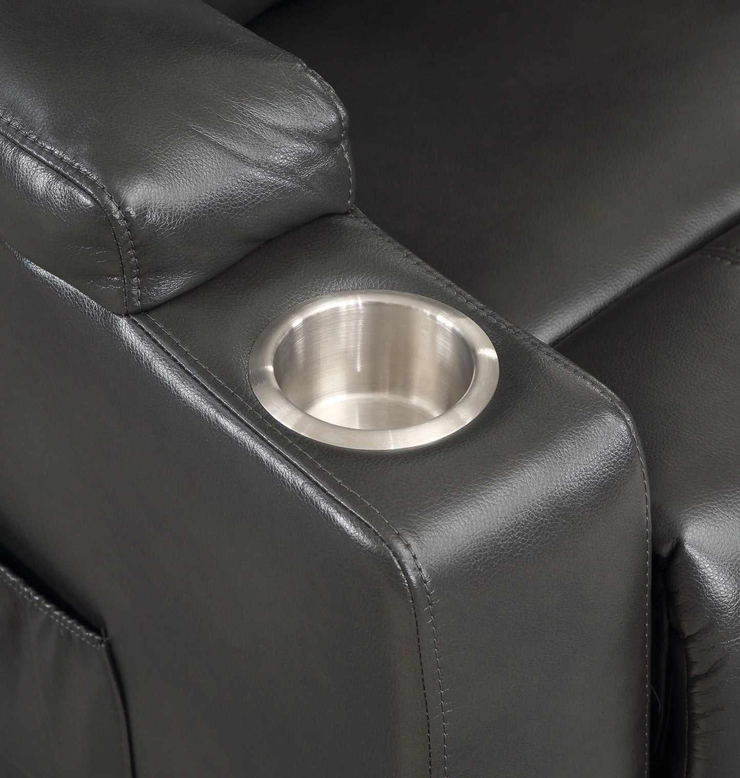 Black leather recliner with a stainless steel cup holder