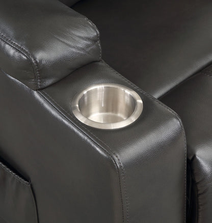 Black leather recliner with a stainless steel cup holder