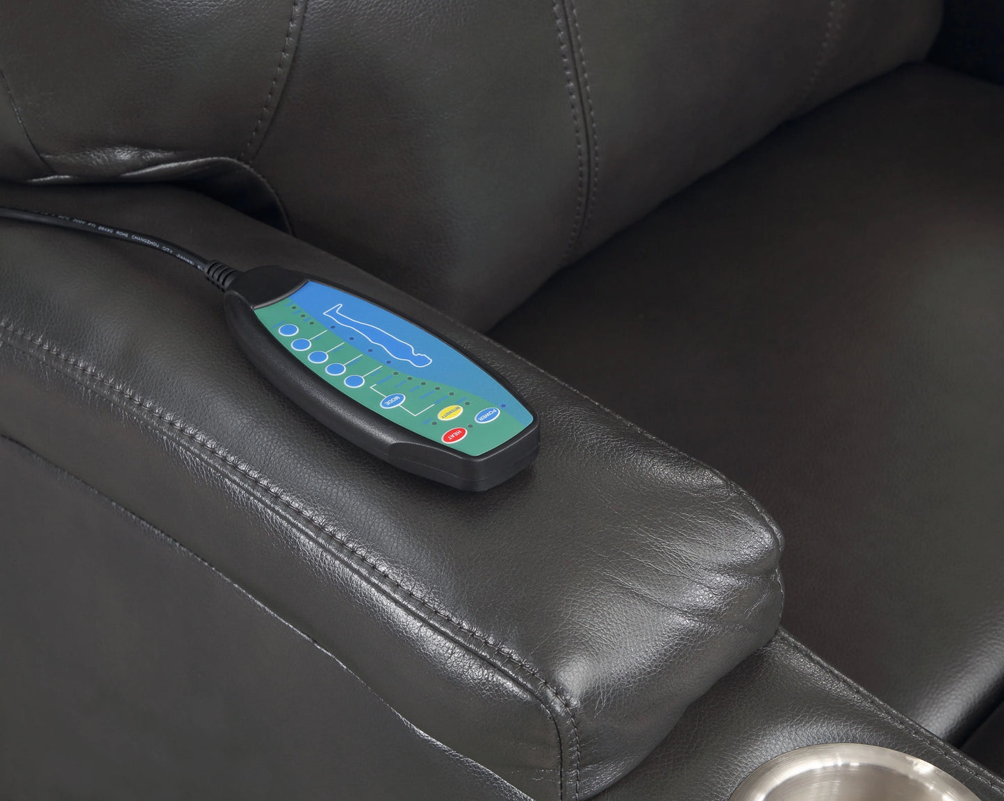 Control panel on a black leather recliner chair