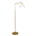 Floor lamp with brass base and white shade on a white background