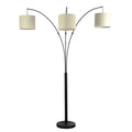 Arc floor lamp with three beige lampshades on a white background