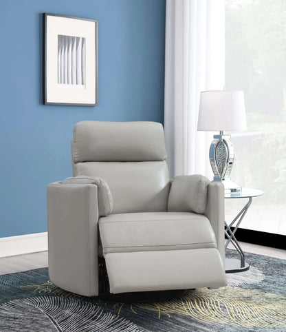 Front angle view of the Sagen Gray Faux Leather Glider Recliner with footrest extended with blue wall, glass end table and carpet.