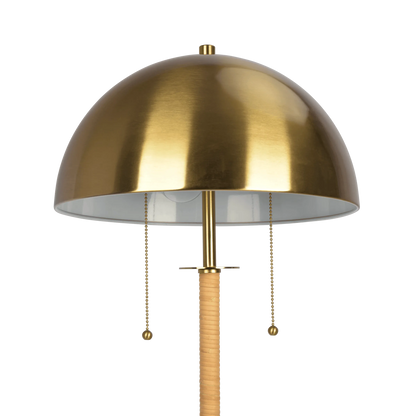 Brass floor lamp metallic shade on a white background