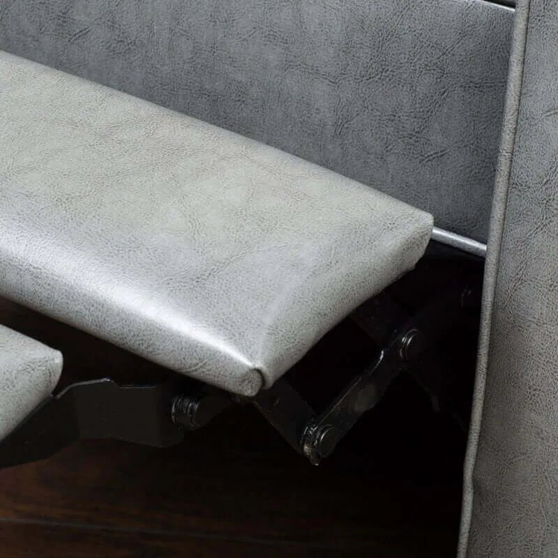 Up close gray recliner chair with footrest extended
