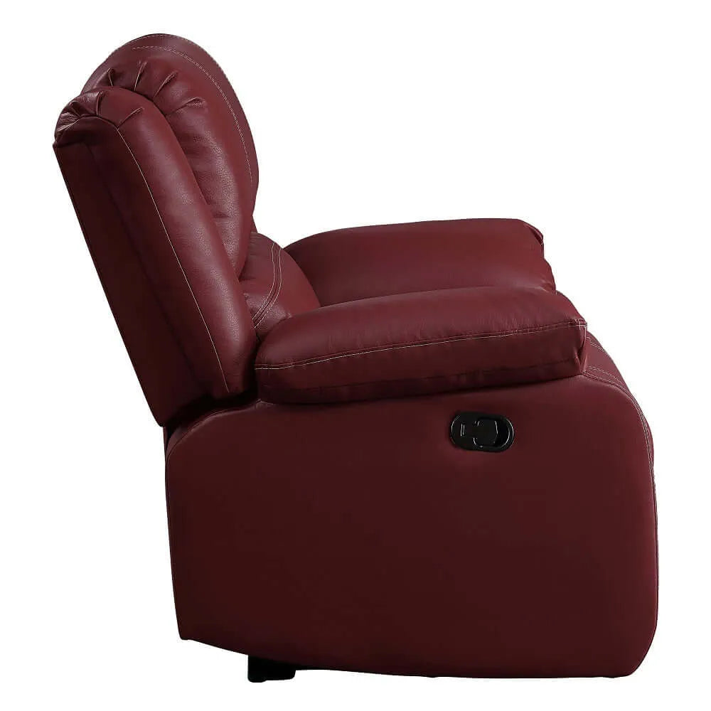 Side view of a red recliner chair and black manual pull tab on a white background