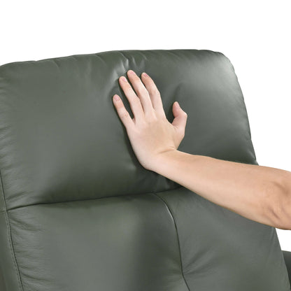 Hand pushing plush cushion on a green leather swivel glider recliner chair on a white background