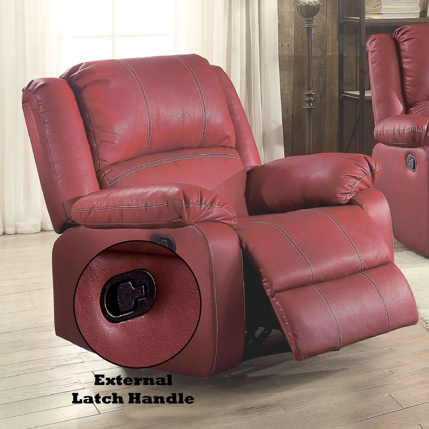 Red leather recliner chair with an external latch handle on a wooden floor.