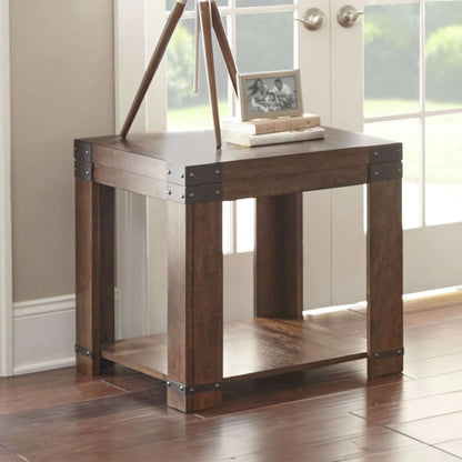 Wooden end table with a bottom shelf in a room with windows