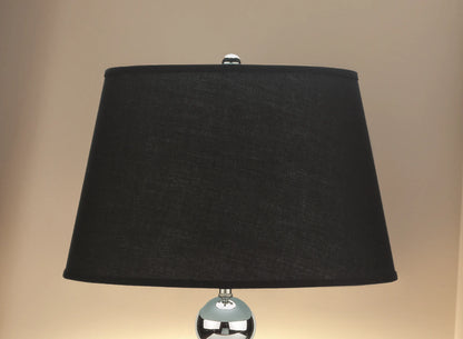 Black lampshade on a beige background