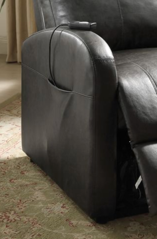 Dark brown faux leather recliner chair with a remote control on the armrest.