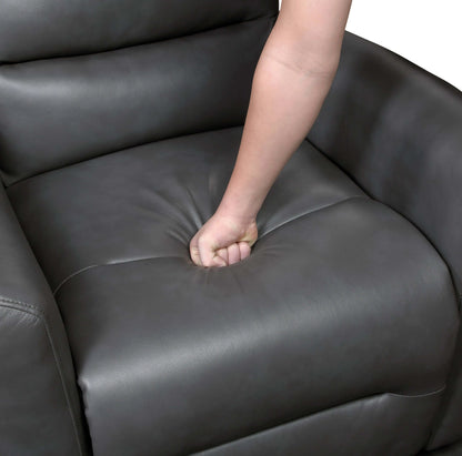 Person's arm resting on a gray recliner chair seat cushion