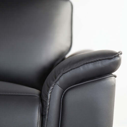 Close-up of a black leather recliner chair pillow arm top on a white background