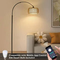 Floor lamp with smartphone app control and smart bulb in a living room setting