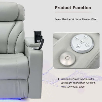 Gray faux leather power recliner and home theater chair with control panel and stereo surround sound audio features.