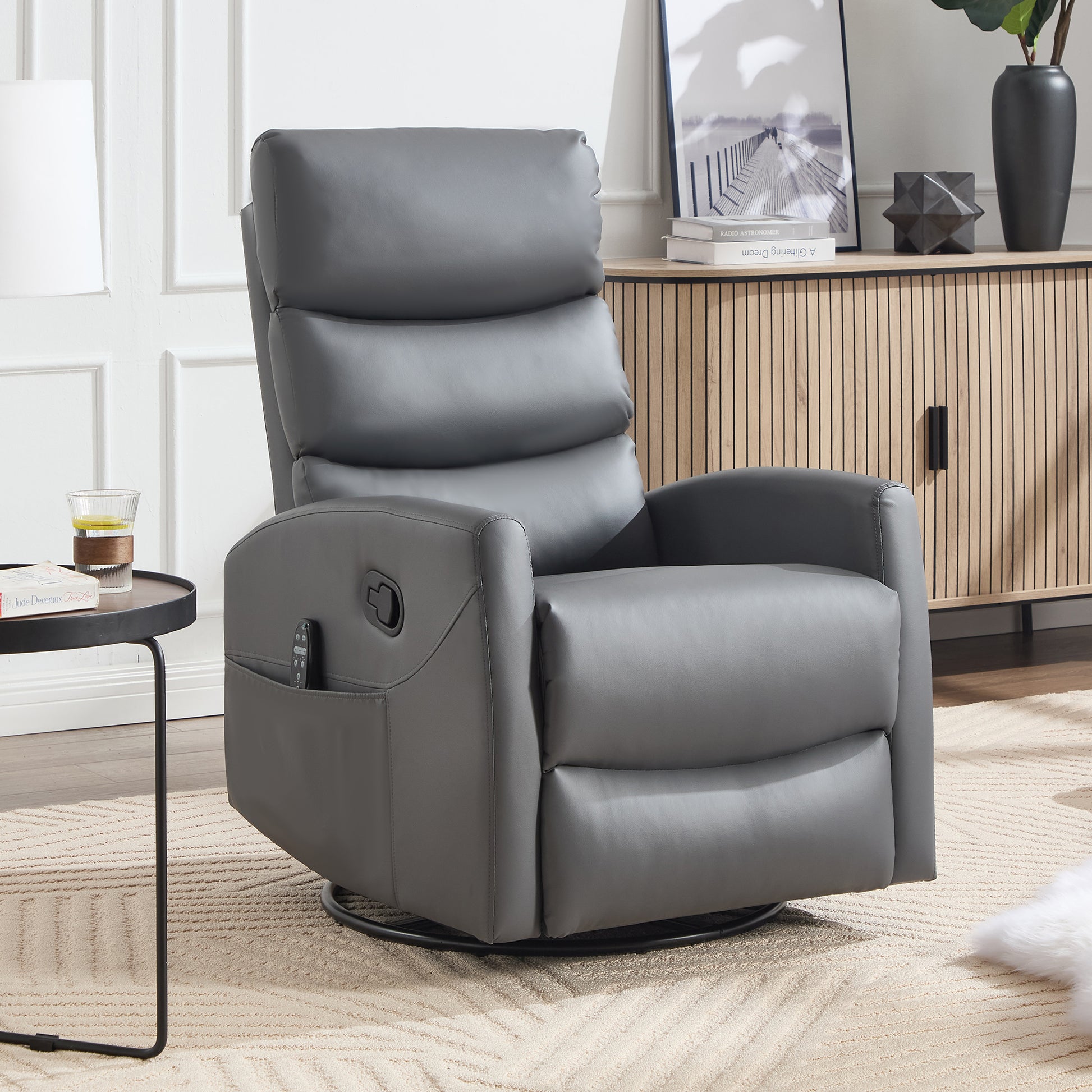 Gray recliner chair in a living room setting with a side table and decor items.