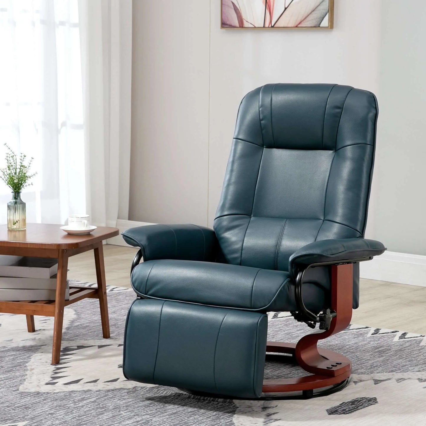Blue leather recliner chair in a living room setting with a wooden table and decorative elements.