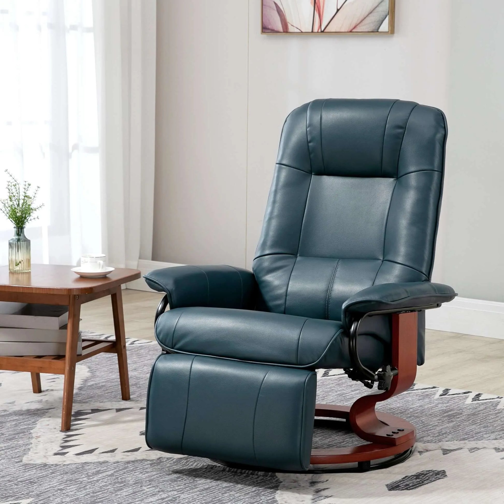 Blue leather recliner chair in a living room setting with a wooden table and decorative elements.