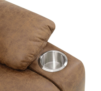 Brown leather recliner chair close up of a stainless steel cup holder on a white background