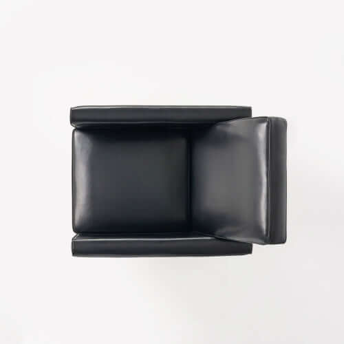 Black Faux Leather Push Back Chair – Elegant Accent for Modern Homes