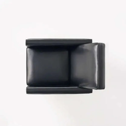 Black Faux Leather Push Back Chair – Elegant Accent for Modern Homes