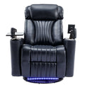 Blue leather recliner chair with cup holders and armrests on a white background