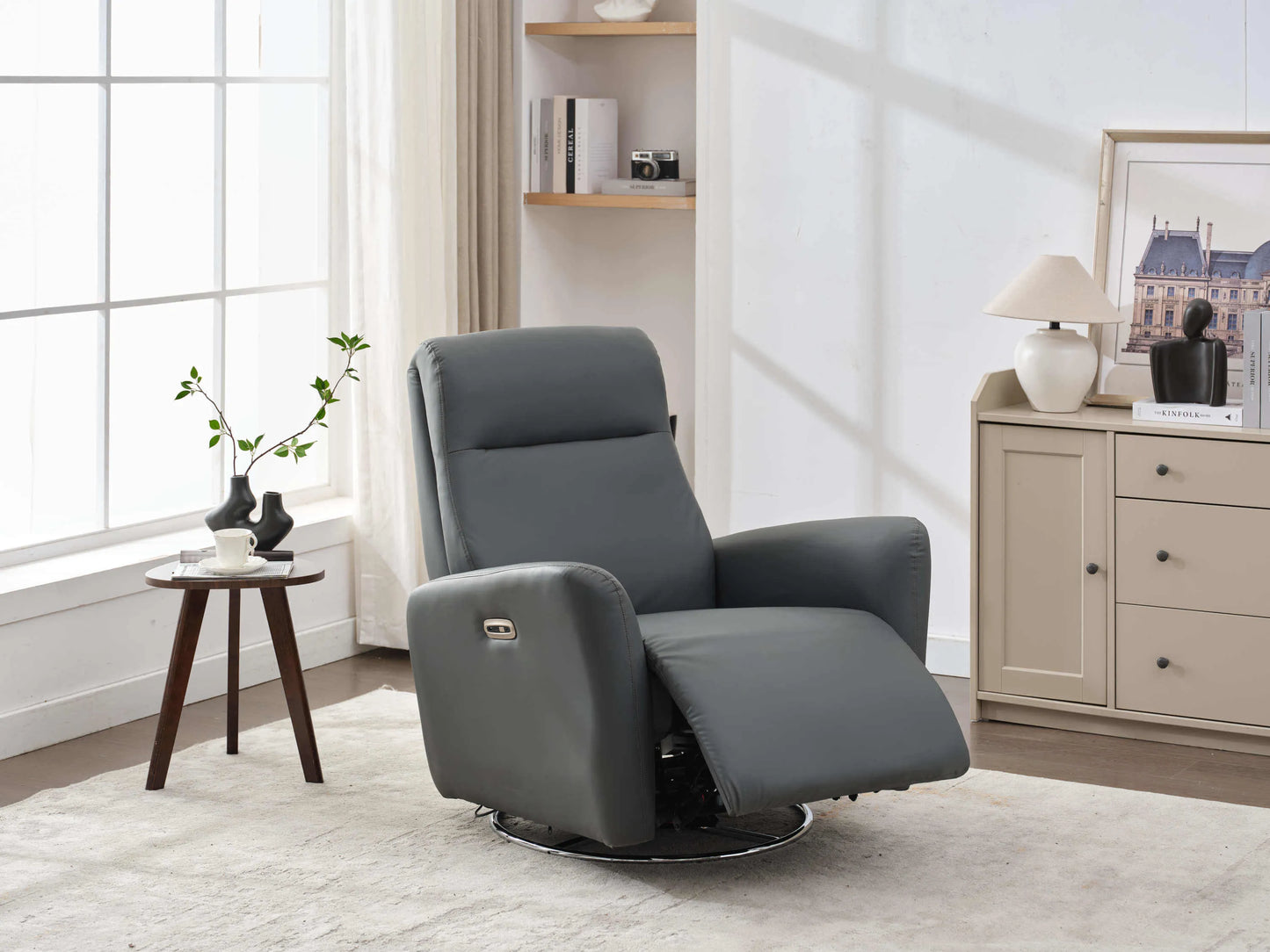 Power Swivel Glider Recliner-Dark Gray andgled with footrest extended in a light room with white carpet