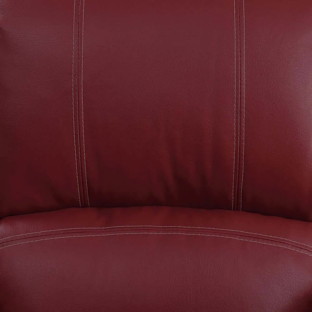 Close-up of a red leather reclining chair  cushion with visible stitching