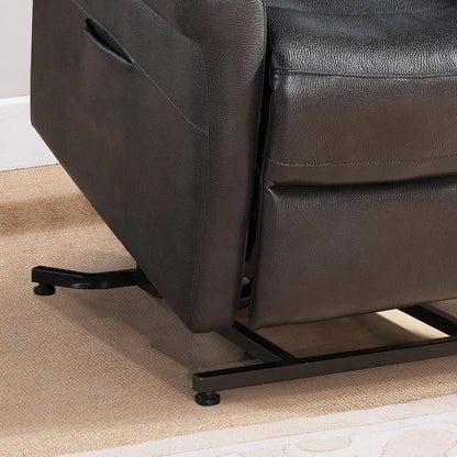 Black faux leather recliner chair with metal legs on a beige carpet
