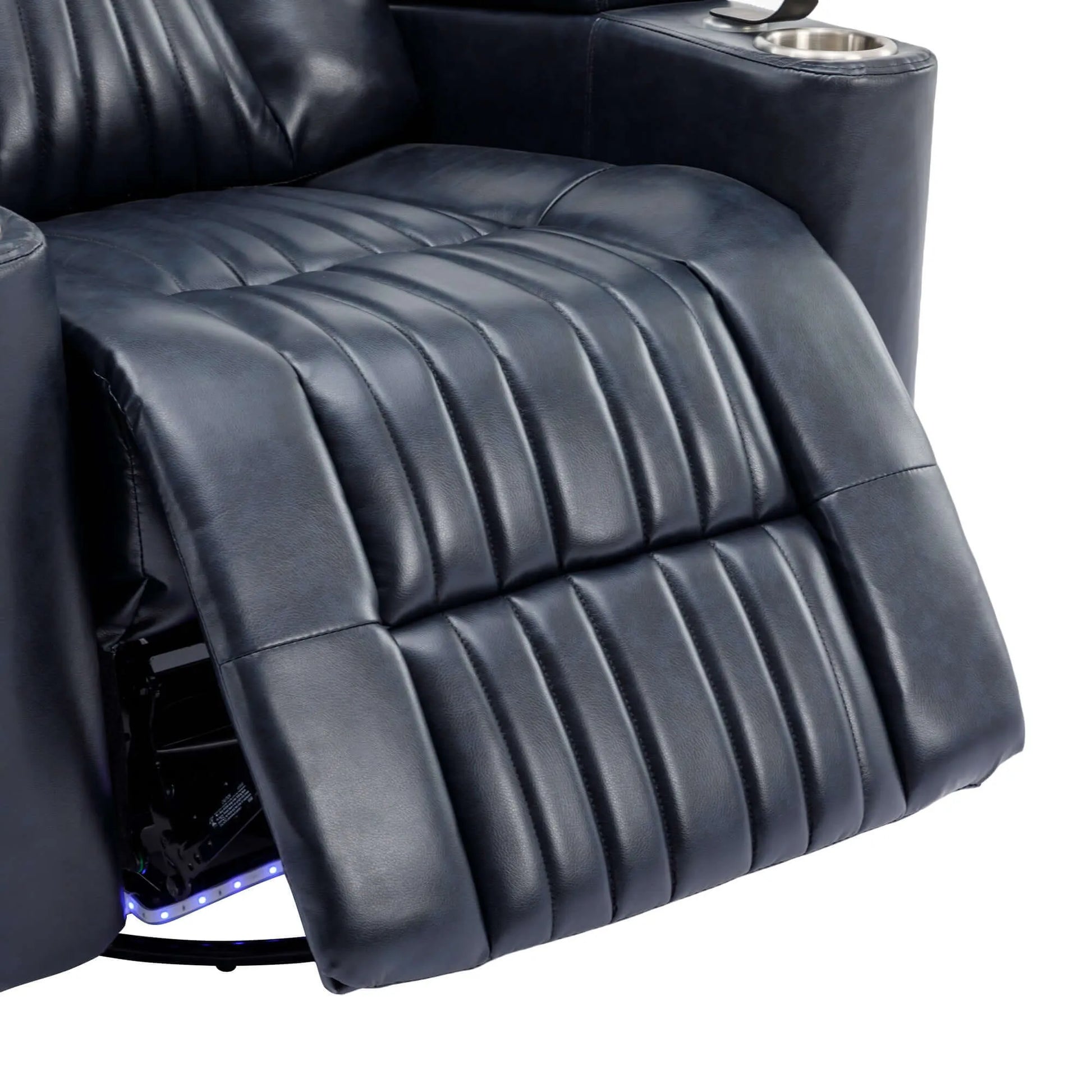 Close-up of a blue leather recliner chair footrest with cup holders on a white background