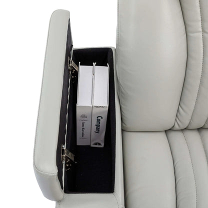 Close up of a gray recliner chair small compartment and box inside on a white background