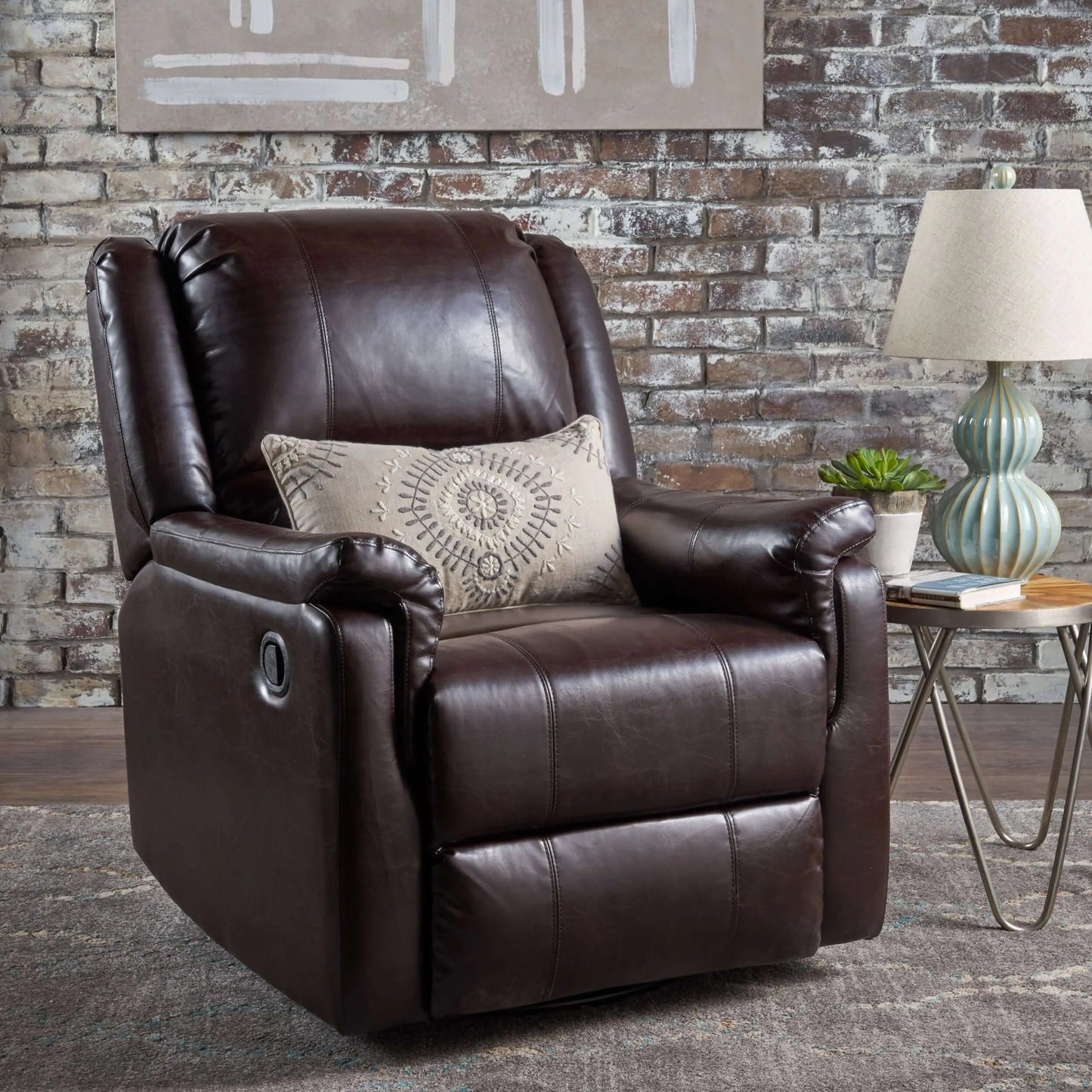 Brown faux leather recliner chair with a decorative pillow in a living room setting.