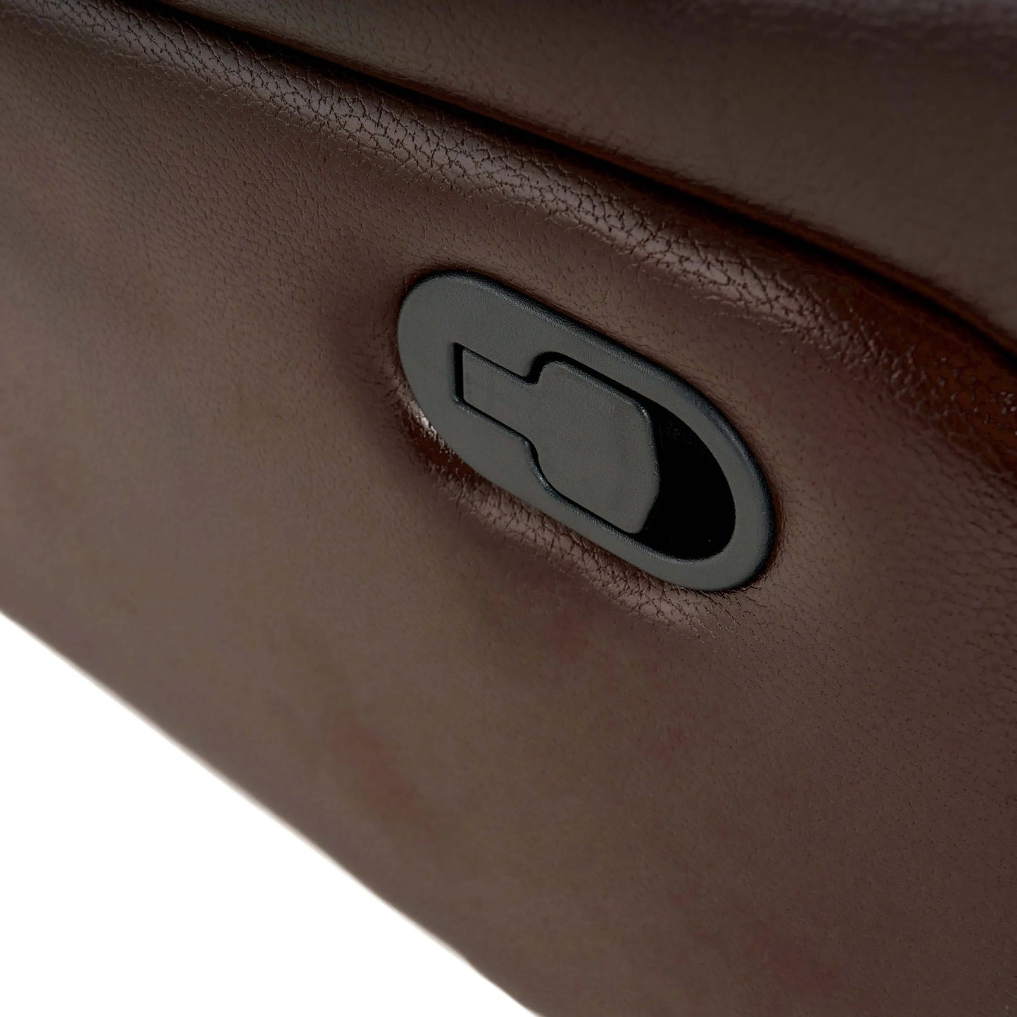 Close-up of a manual recline button on a dark brown faux leather glider recliner on white background