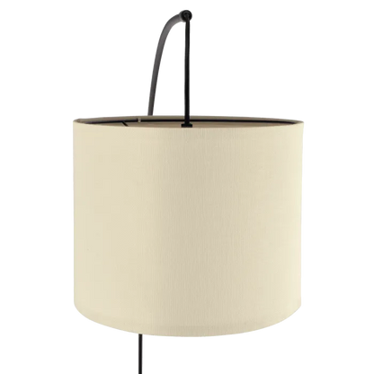 Beige lampshade with black fixture on a white background