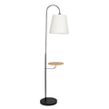 Floor lamp with a white shade and wooden side table on a white background